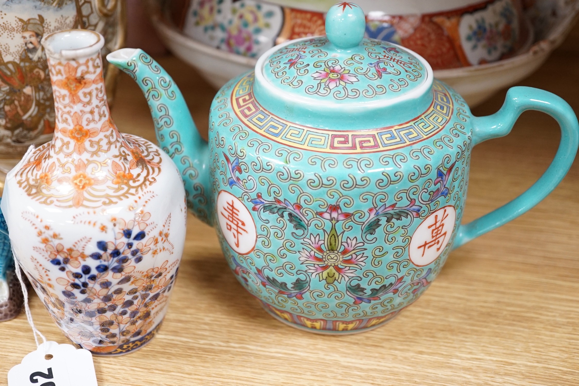 Japanese ceramics to include a Satsuma vase, 25 cm high, a Kutani style tureen and cover, a koransha bottle vase, together with a Chinese tea pot and two figures of ducks